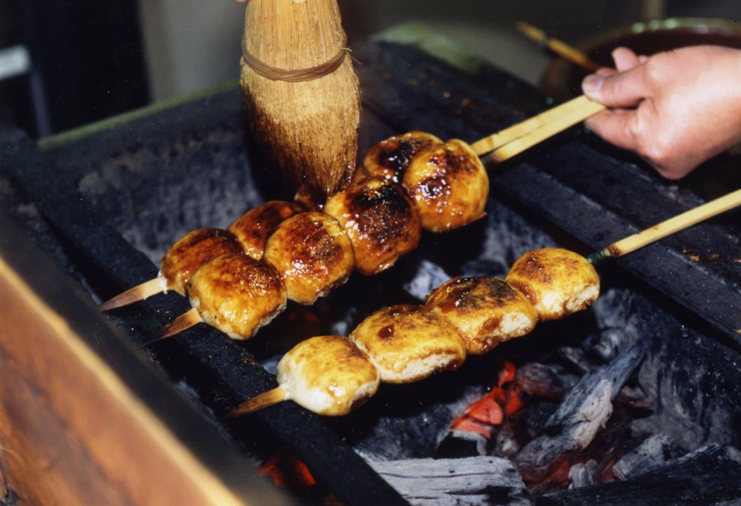 Yaki-manju, a Gunma speciality of buns glazed with sweet miso and grilled over charcoal